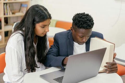 Students working on laptop